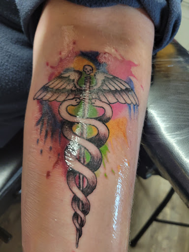 Explore tattoo ideas inner bicep, creative tattoo ideas in Charlottesville, available at ScottyrocksTwisted Inks