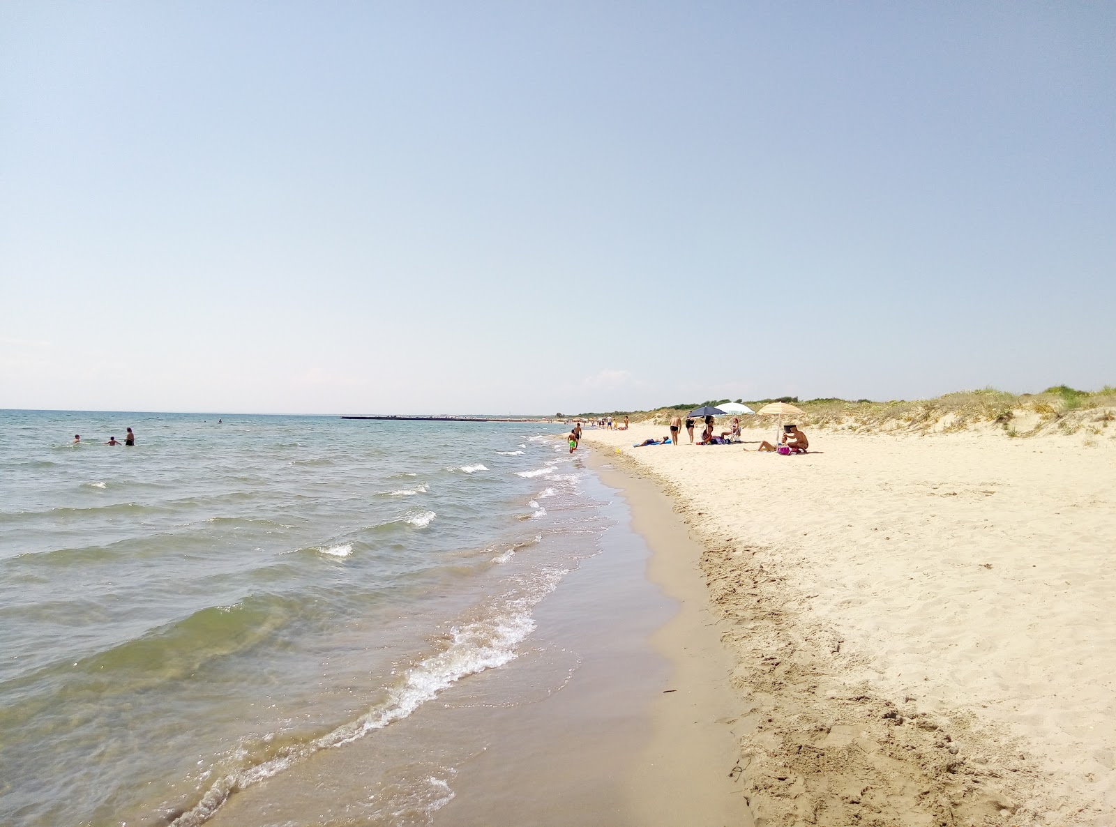 Foto av Spiaggia di Verde Mare med lång rak strand
