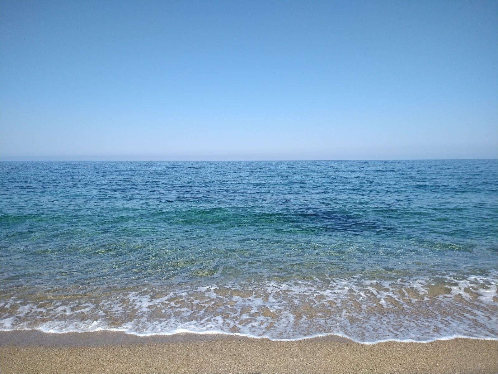 Foto de Playa de Portu Maga área de servicios