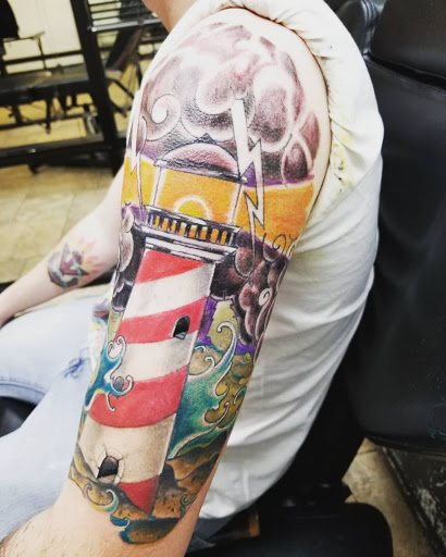 Explore black hole tattoo ideas, creative tattoo ideas in Calera, available at Tattoo Jungle