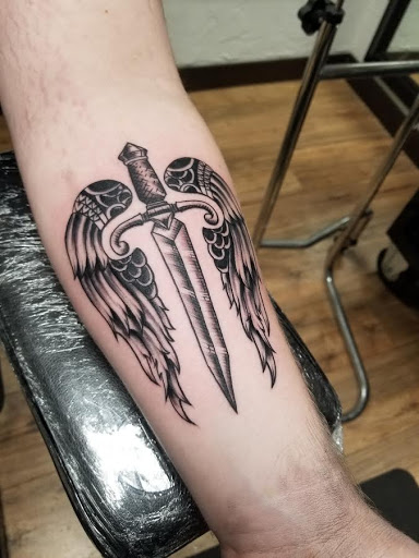 Explore candle tattoo ideas, creative tattoo ideas in Edinboro, available at No Regrets Tattoo (Appointment Only)
