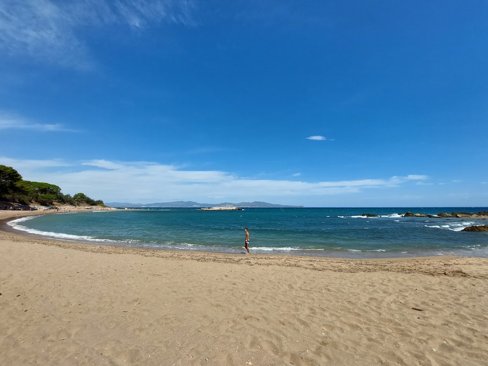 Foto av Les Muscleres Beach med turkos rent vatten yta