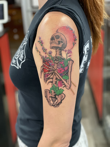 Explore ball python tattoo ideas, creative tattoo ideas in Jersey City, available at 7 Souls Tattoo & Body Piercing