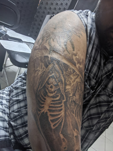 Explore saw movie tattoo ideas, creative tattoo ideas in Schaumburg, available at Atmosphere Tattoo Gallery - Schaumburg