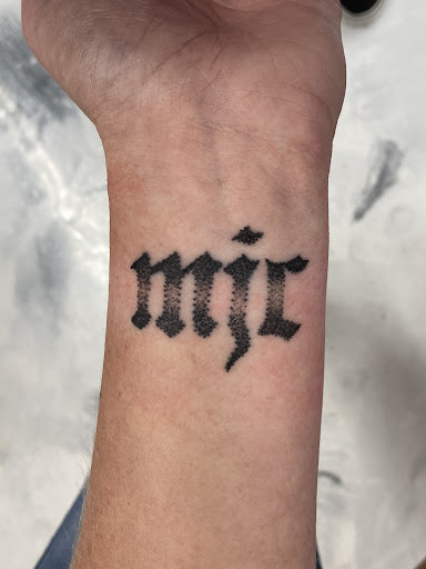 Explore red cardinal tattoo ideas, creative tattoo ideas in Deridder, available at Pine Street Tattoo & Piercing LLC