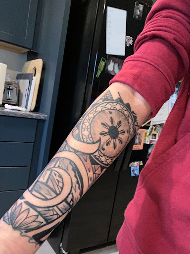 Explore flower spine tattoo ideas, creative tattoo ideas in Wasilla, available at Doulos Tattoo, The Tattoo Shop