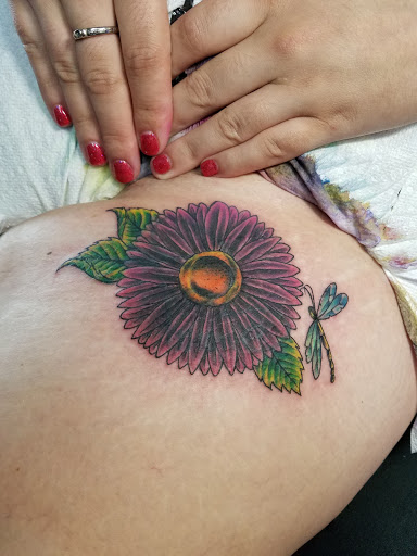 Explore sunflower and butterfly tattoo ideas, creative tattoo ideas in Atlanta, available at Long Island Ink