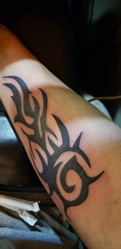 Explore small hand tattoo ideas, creative tattoo ideas in Scottsboro, available at 5 Points Tattoo