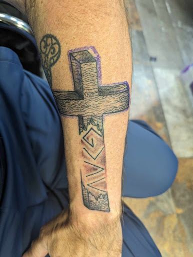 Explore father tattoo ideas for son, creative tattoo ideas in Kansas City, available at Beautiful Body Tattoo and Piercings