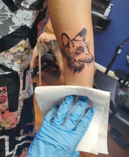 Explore twin tattoo ideas, creative tattoo ideas in Cocoa, available at Rorschach Tattoo Shop and Piercing Studio