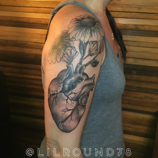 Explore name sleeve tattoo ideas, creative tattoo ideas in Johns Island, available at The Gilded Mermaid Tattoo Studio