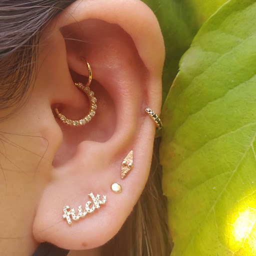 Explore women's arm tattoo ideas, creative tattoo ideas in Laguna Beach, available at Laguna Gold