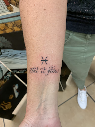 Explore tattoo flower ideas, creative tattoo ideas in Tampa, available at Angel Tattoo