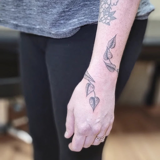 Explore tattoo ideas for mens leg, creative tattoo ideas in Carbondale, available at Bonedale Tattoo