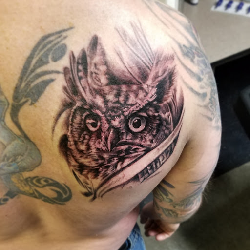 Tattoo Shop «Next Level Tattoo Company - Imlay City», reviews and photos, 420 E 3rd St, Imlay City, MI 48444, USA