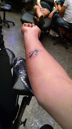 Explore ear tattoo ideas for females, creative tattoo ideas in Chicago, available at Tattoo Factory