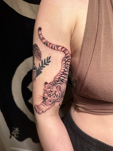 Explore triplet tattoo ideas, creative tattoo ideas in Austin, available at Black Swan Tattoo Company