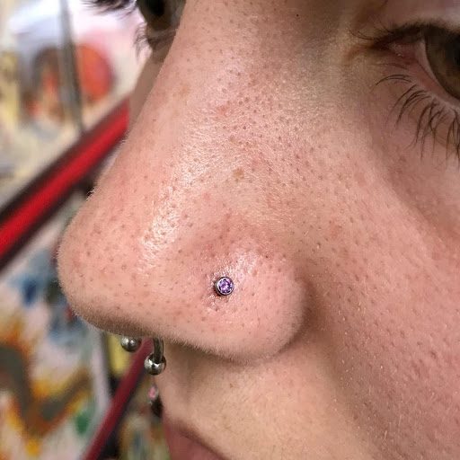 Explore black heart tattoo ideas, creative tattoo ideas in Millsboro, available at Tattoo Galaxy (Millsboro) Piercing & Custom tattoos