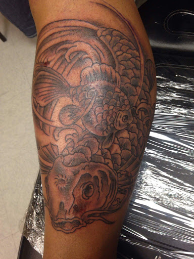 Find simple mom tattoo ideas for your next unique tattoo in Cheyenne at The T.R.I.B.E. Zoo, LLC Tattoo