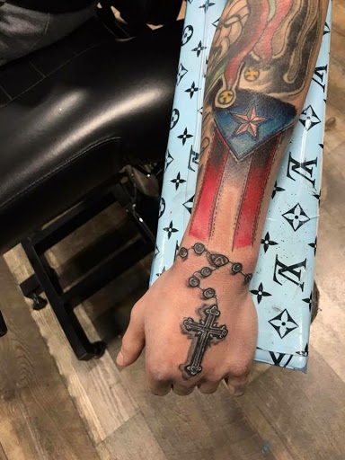 Explore lightsaber tattoo ideas, creative tattoo ideas in Frankfort, available at The Reef Tattoo