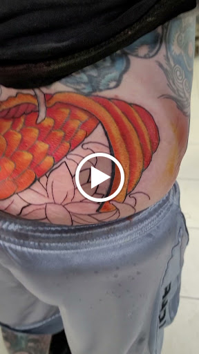 Explore black and white tattoo ideas, creative tattoo ideas in Ocoee, available at Slaughterized Ink Tattoo and Piercing Studio