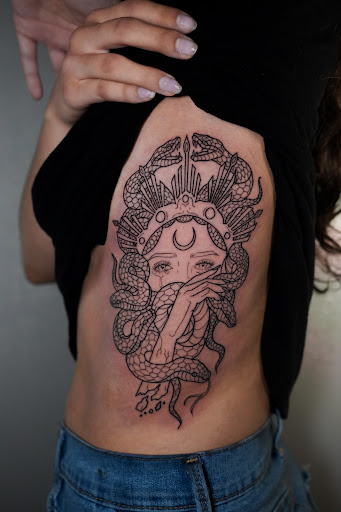 Explore dog sleeve tattoo ideas, creative tattoo ideas in Rowlett, available at Sinners Tattoo Studio and Supply
