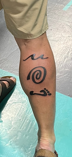 Explore lily tattoo ideas, creative tattoo ideas in Houston, available at Los Muertos Tattoo Studio and Art Gallery