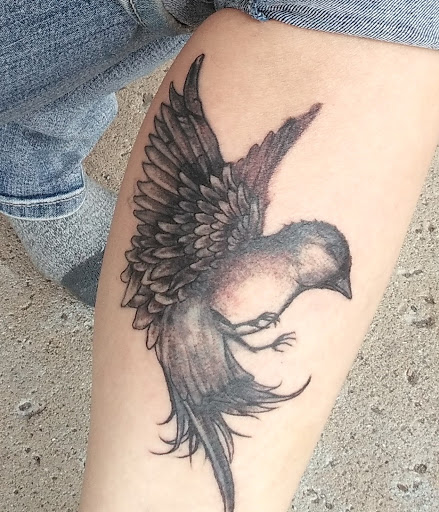 Explore photographer tattoo ideas, creative tattoo ideas in Coldwater, available at Relevant Tattoo and Piercing