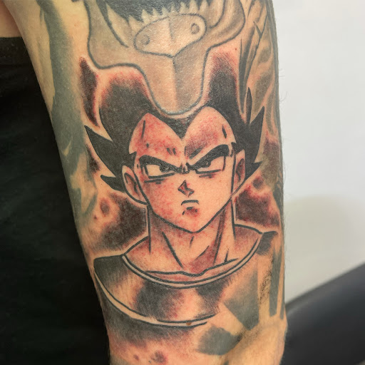 Explore cross tattoo sleeve ideas, creative tattoo ideas in Bogota, available at Lolas Tattoo Shop