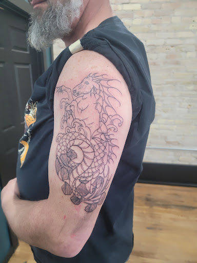 Explore rainbow tattoo ideas, creative tattoo ideas in Dillon, available at Lacuna Studios