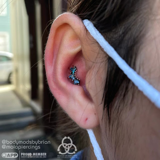 Explore small frog tattoo ideas, creative tattoo ideas in Charleston, available at MOLA Piercing and Fine Jewelry