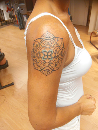 Explore shark tooth tattoo ideas, creative tattoo ideas in La Crosse, available at La Crosse Tattoo