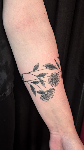 Explore nigerian tattoo ideas, creative tattoo ideas in Rochester, available at Axe of Kindness Tattoo