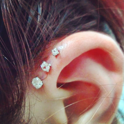 Find gemstone tattoo ideas for your next unique tattoo in Gainesville at Pizzazz Piercing & Tattoo