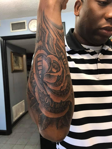 Explore flower bouquet tattoo ideas, creative tattoo ideas in Mobile, available at Old Familiar Tattoo Company