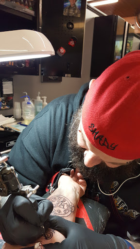 Explore jake the dog tattoo ideas, creative tattoo ideas in Prince Frederick, available at Red Octopus Tattoos