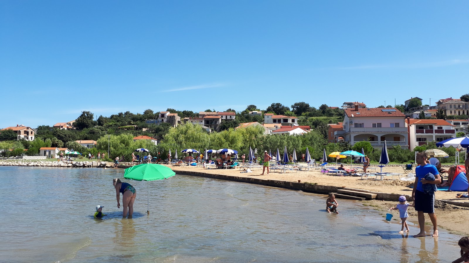 Foto di Lopar beach con baia piccola