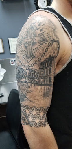 Explore tattoo ideas for men bicep, creative tattoo ideas in Delray Beach, available at Ink Boss Tattoo Studios