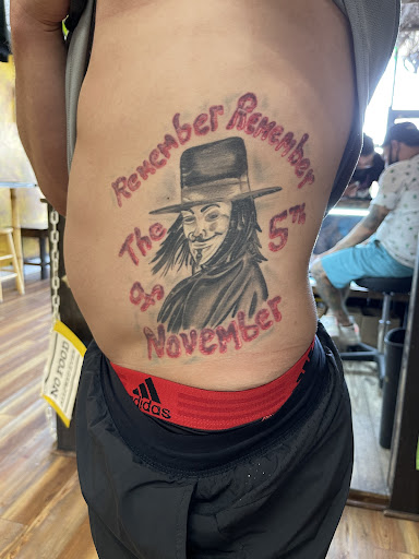 Explore hand tattoo ideas man, creative tattoo ideas in Pottsville, available at Good Vibrations Ink Tattoo and Body Piercing