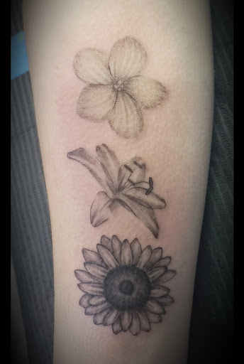 Explore time flies tattoo ideas, creative tattoo ideas in Muscatine, available at The Sapphire Lounge