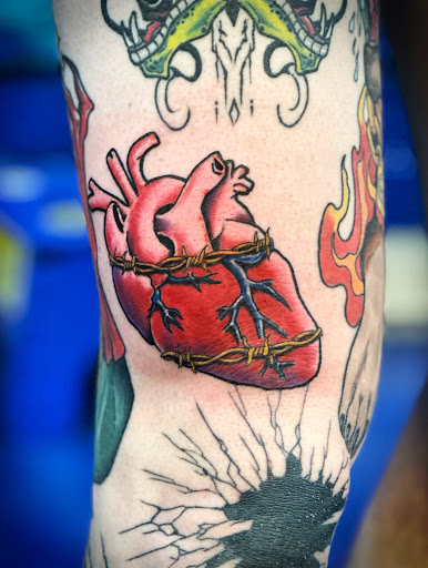 Explore cancer ribbon tattoo ideas, creative tattoo ideas in Little Rock, available at Blu Flame Ink