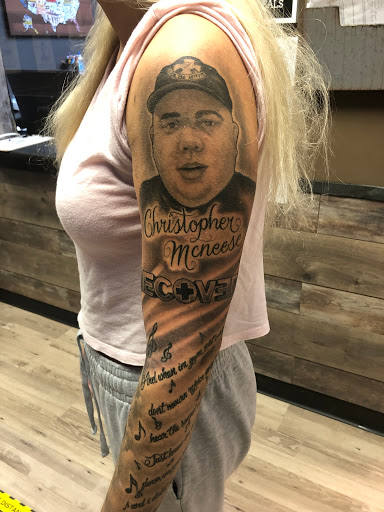 Explore lower back tattoo cover up ideas, creative tattoo ideas in Troy, available at All In Tattoo Co.