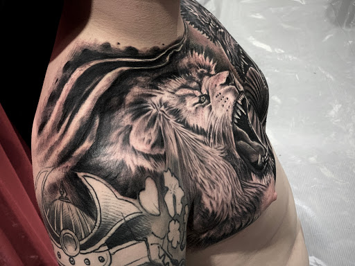 Explore nf tattoos ideas, creative tattoo ideas in Springfield, available at Triumph Tattoo