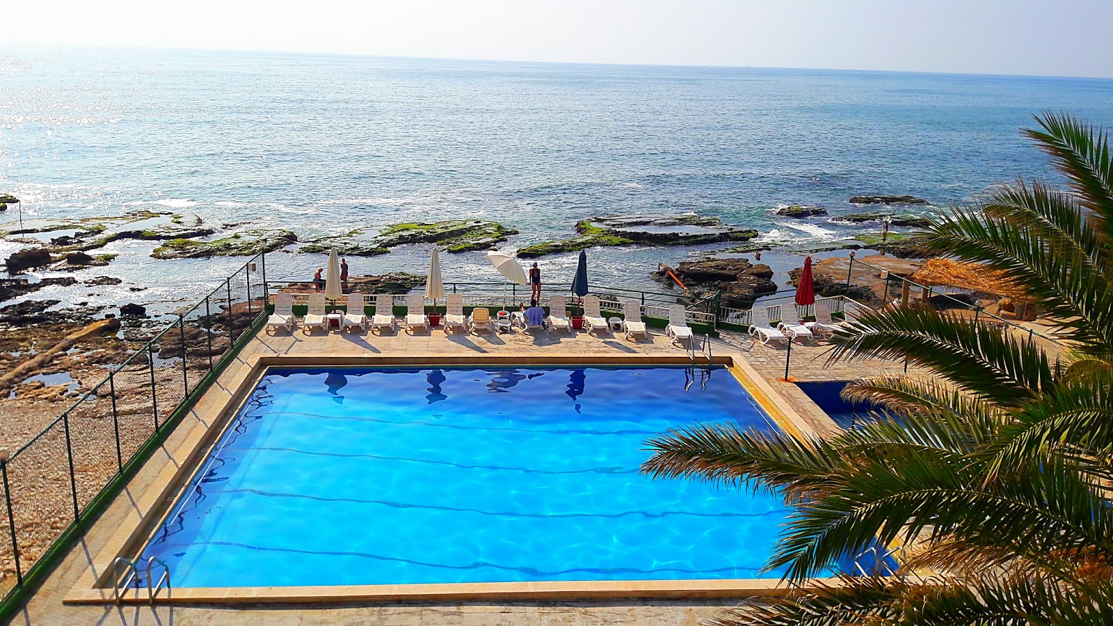 Photo of Happy Beach with rocks cover surface