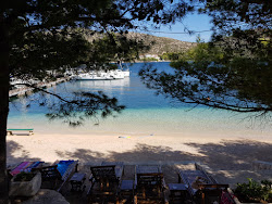Porto Rosso beach'in fotoğrafı küçük koy ile birlikte