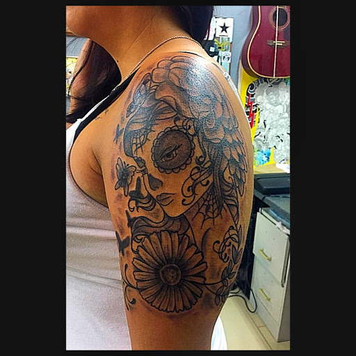 Explore side boob tattoo ideas, creative tattoo ideas in San Antonio, available at Adrenaline Tattoo & Body Piercing