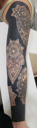 Explore surfing tattoo ideas, creative tattoo ideas in Biloxi, available at Carnivale Tattoo