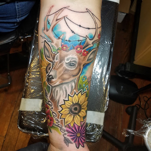 Tattoo Shop «Moth Studio», reviews and photos, 428 W Commercial St, Springfield, MO 65803, USA