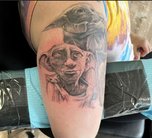 Explore father and son tattoos ideas, creative tattoo ideas in East Rochester, available at Spice City Tattoo