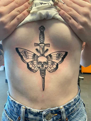 Explore medical assistant tattoo ideas, creative tattoo ideas in Palm Harbor, available at Angry Owl Tattoo and Piercing